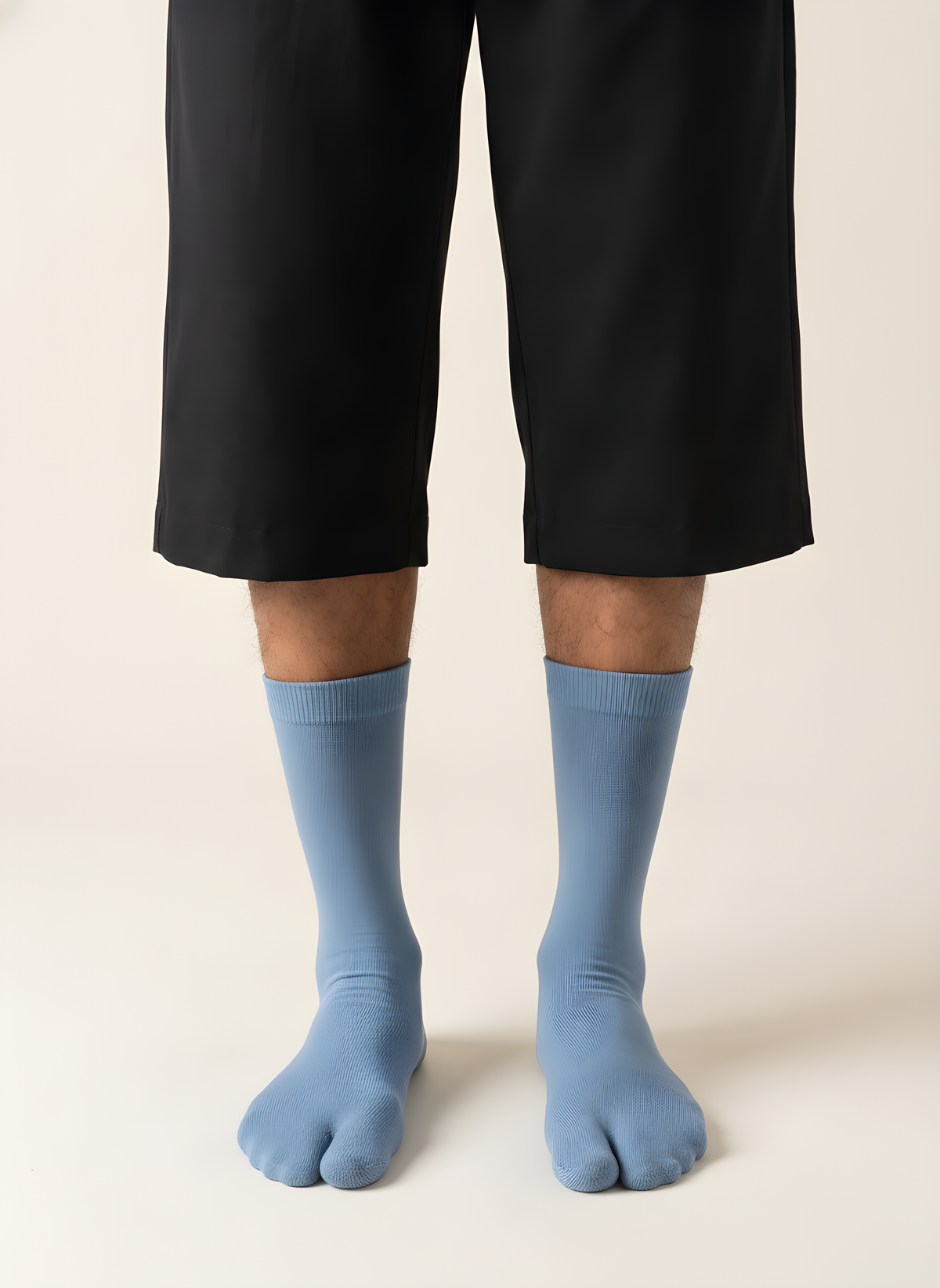 Cotton Split-Toe Tabi Socks in Light Blue, on model