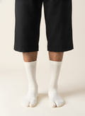 Cotton Split-Toe Tabi Socks in Cream, on model
