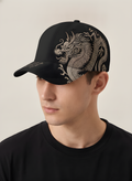 Embroidered Dragon Baseball Cap in Black, on model