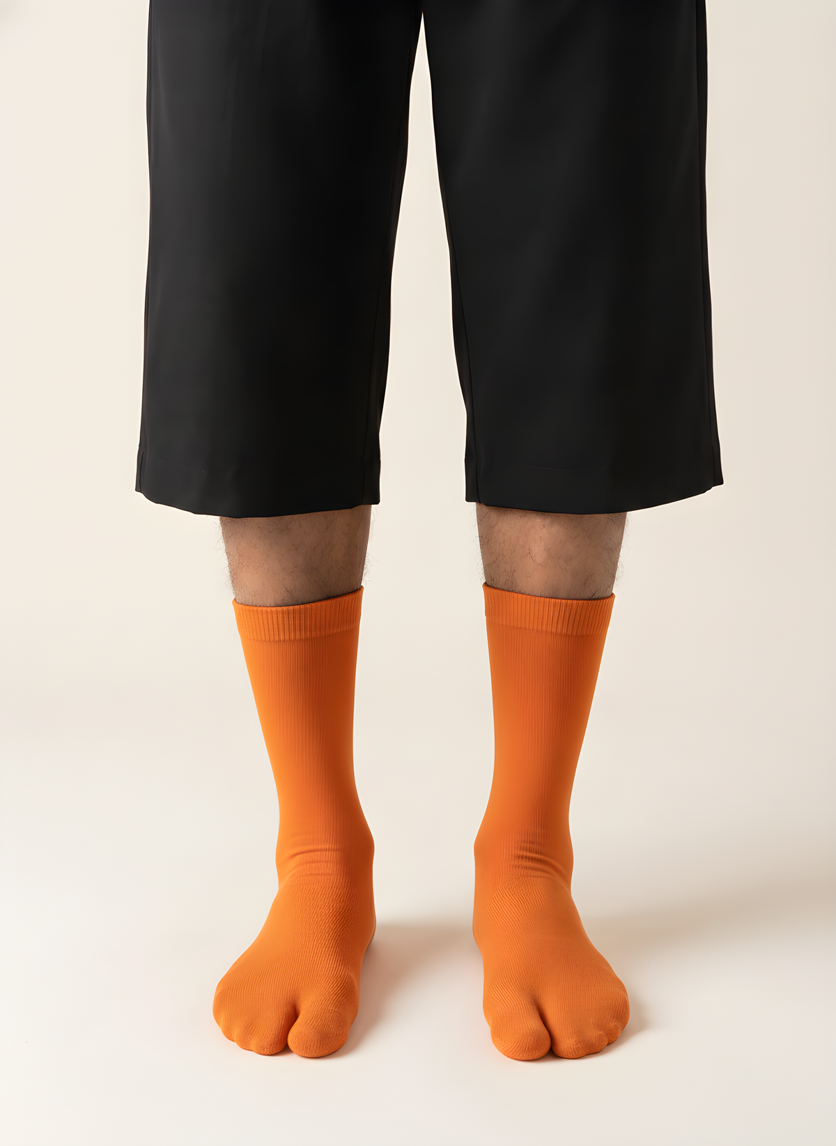 Cotton Split-Toe Tabi Socks in Orange, on model