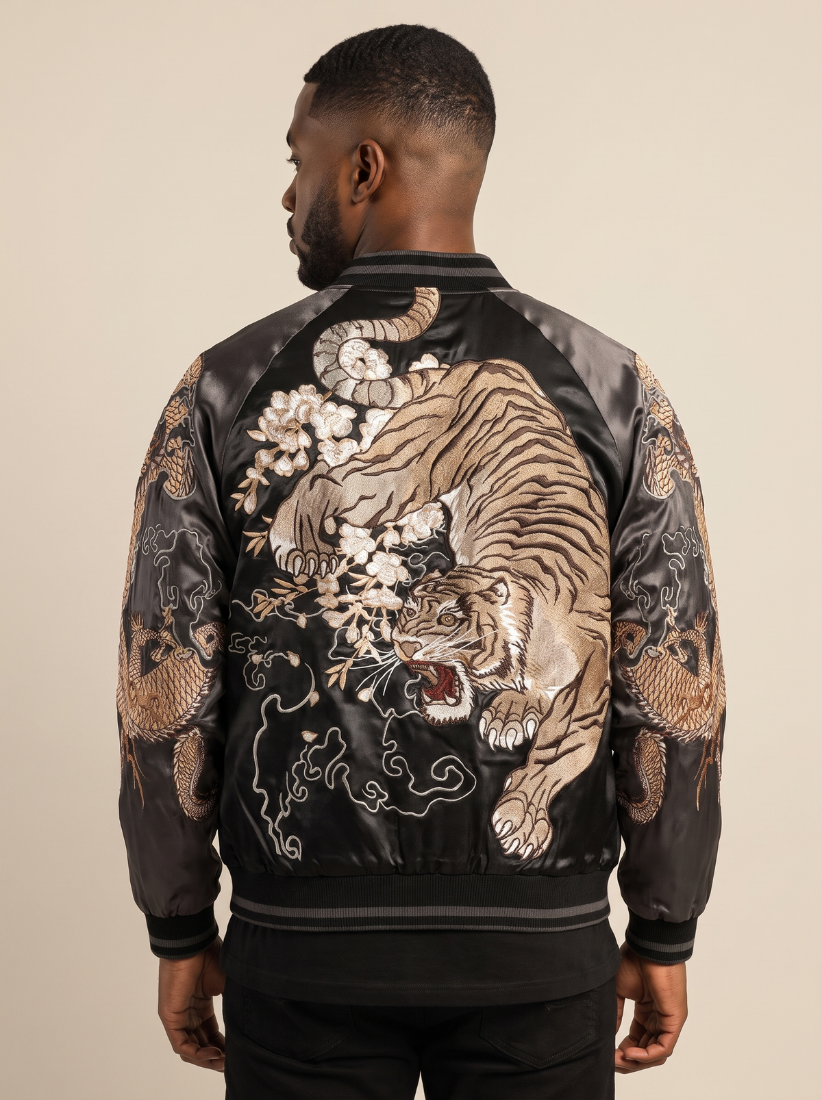 Dragon vs Tiger Raglan Sukajan Jacket in Charcoal, back view on model