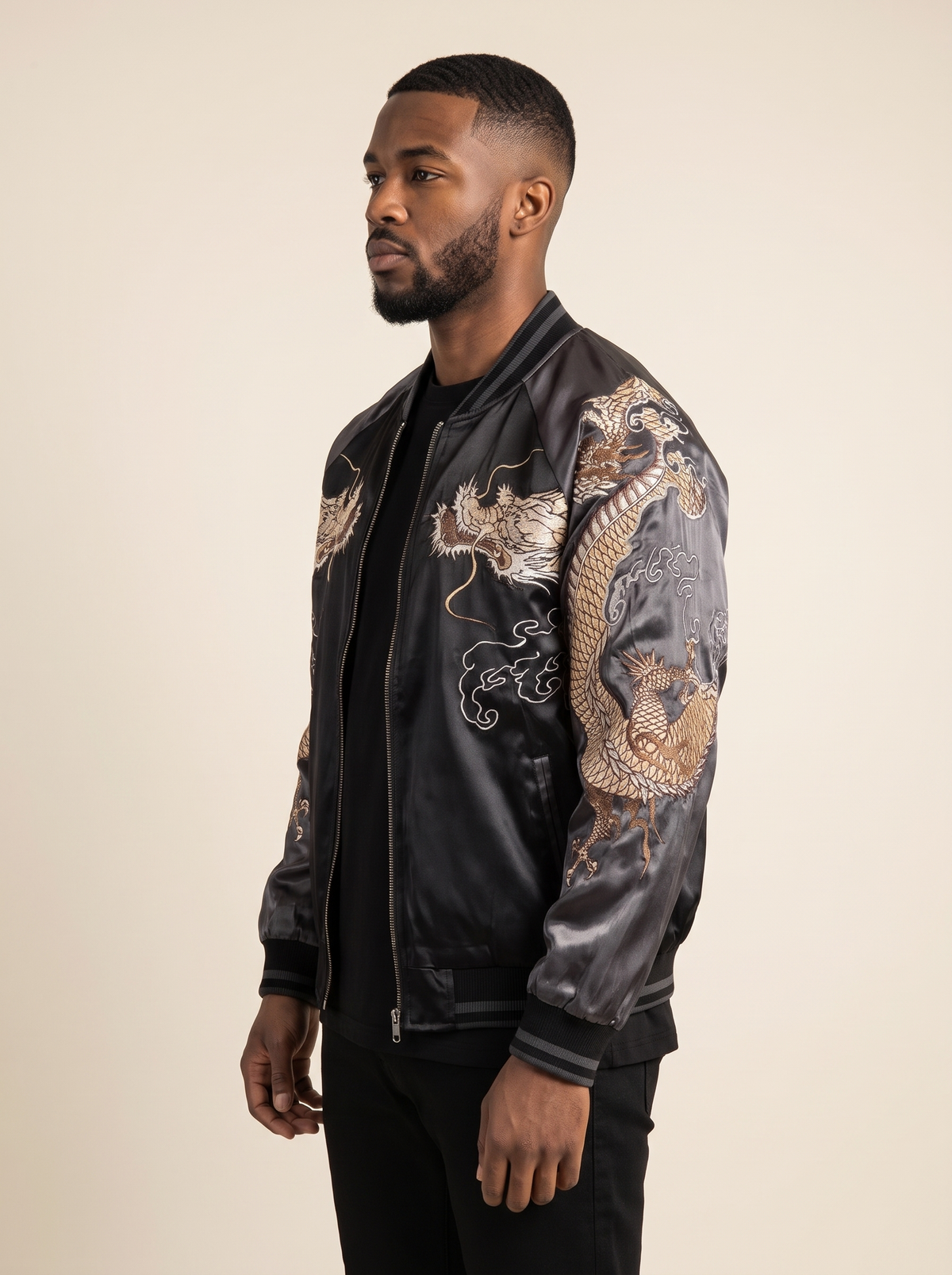 Dragon vs Tiger Raglan Sukajan Jacket in Charcoal, side view on model