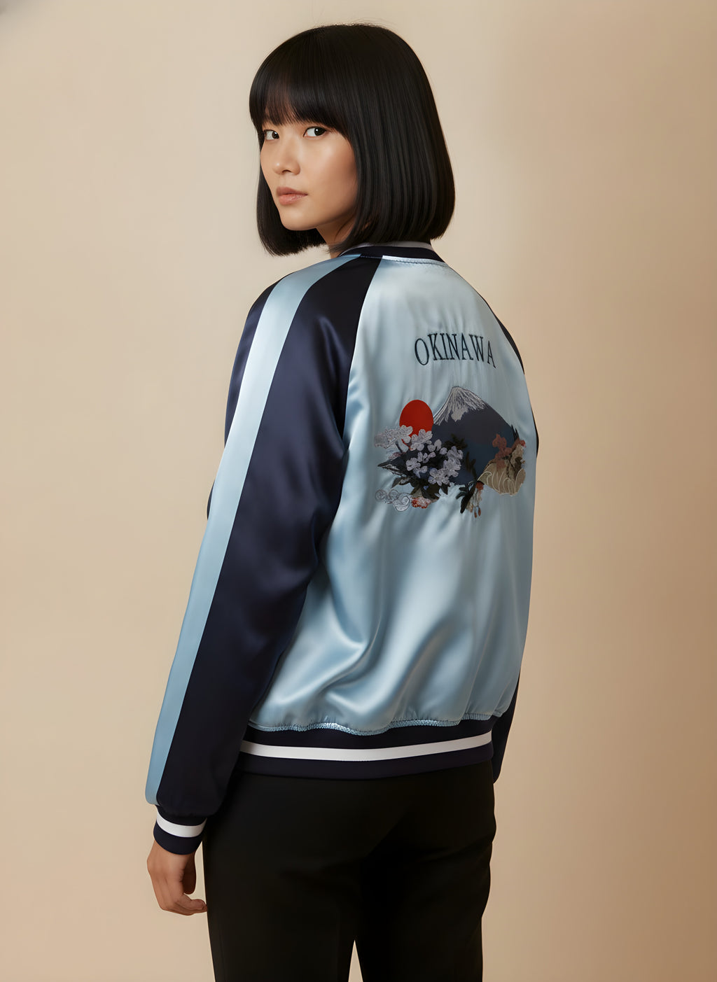 Women's reversible satin sukajan turned to the light blue side, back view on model