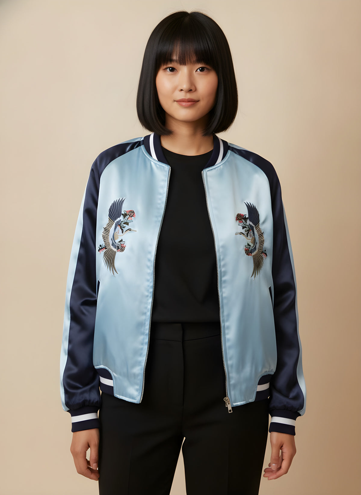 Women's reversible satin sukajan turned to the light blue side, front view on model